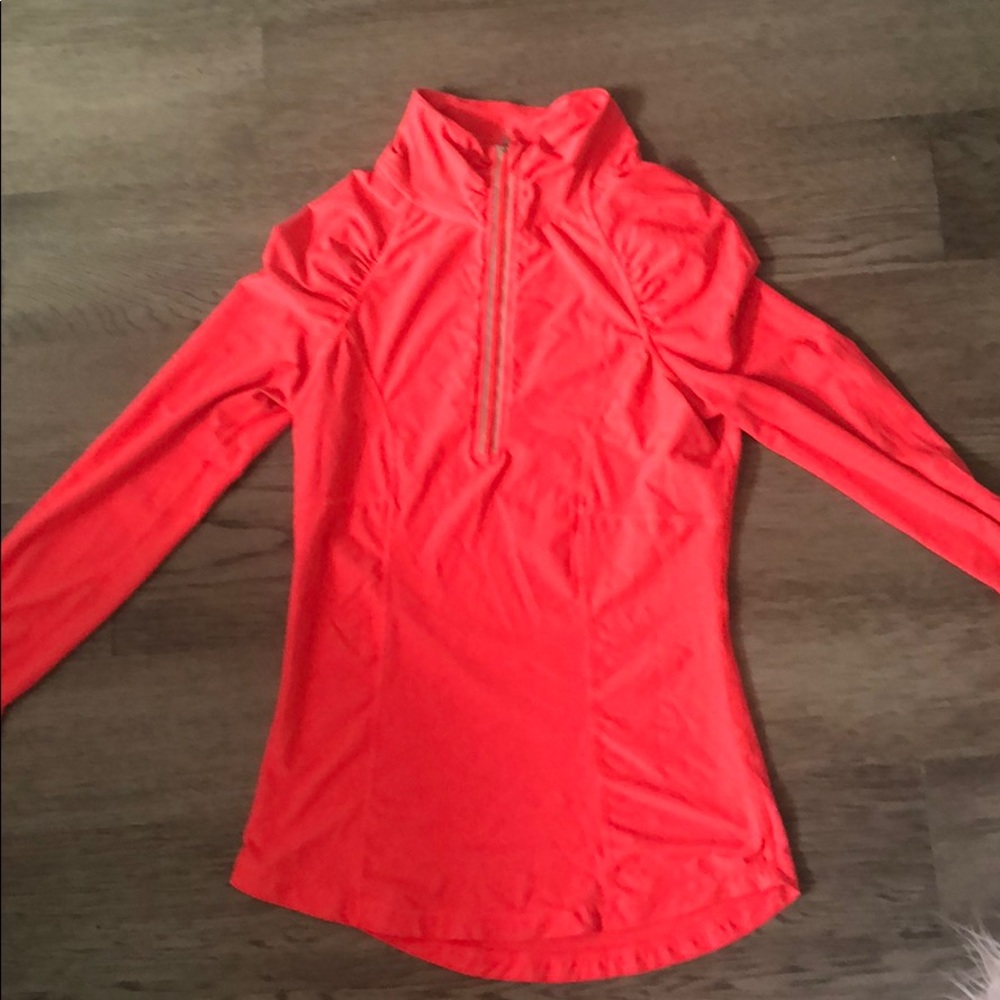 Bright pink running shirt.